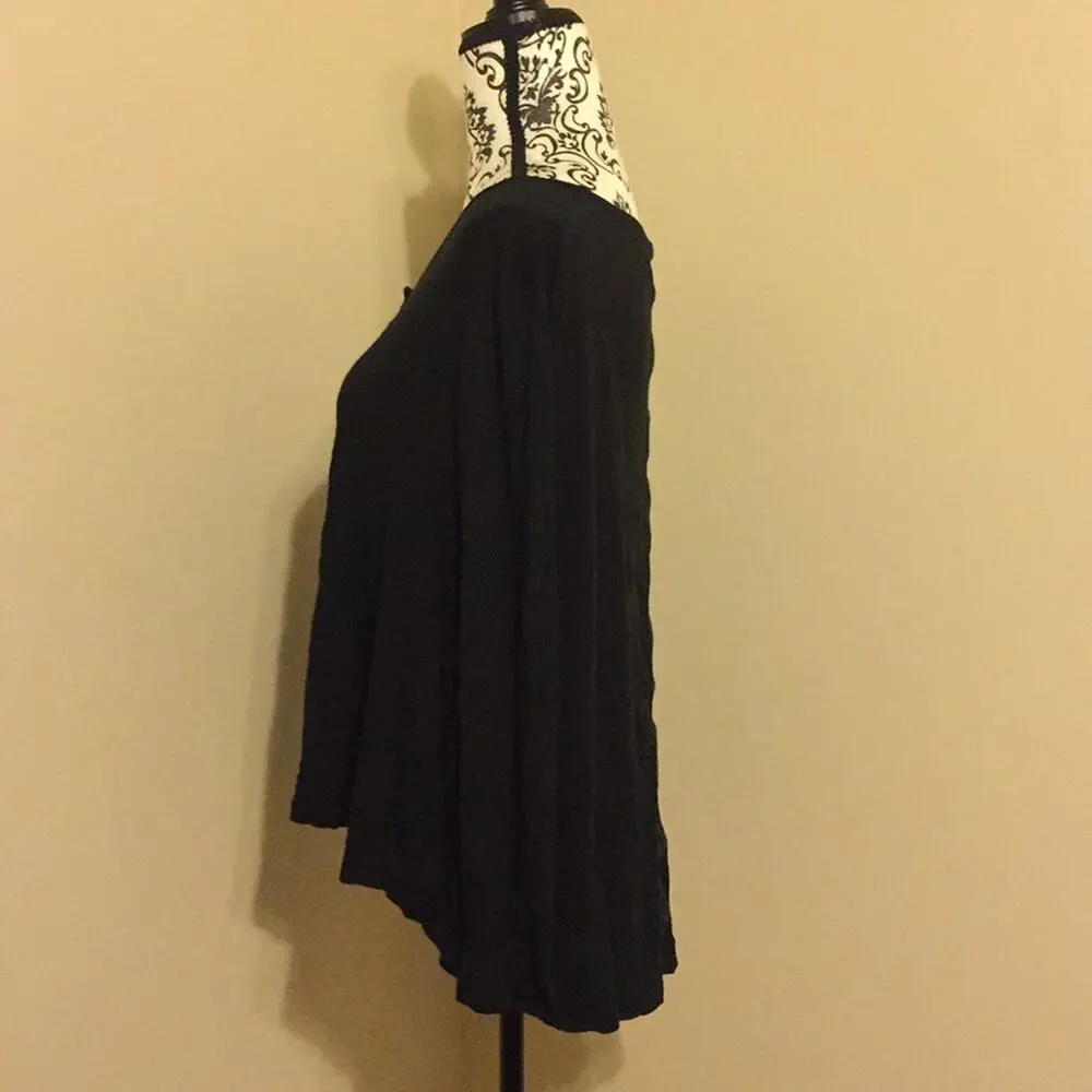 Cute top shorter in the front longer in the back.